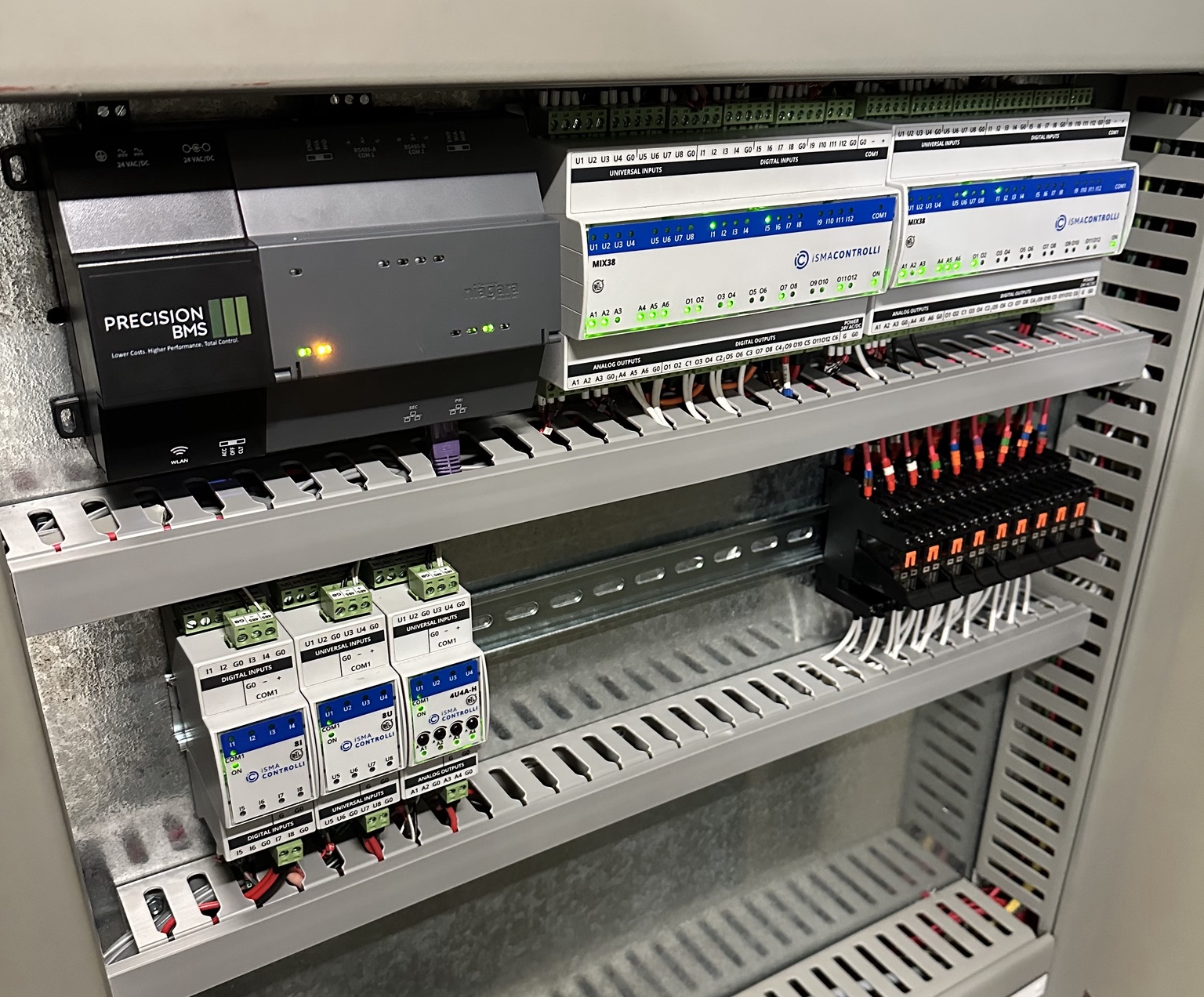Precision BMS control panel with connected controllers and wiring